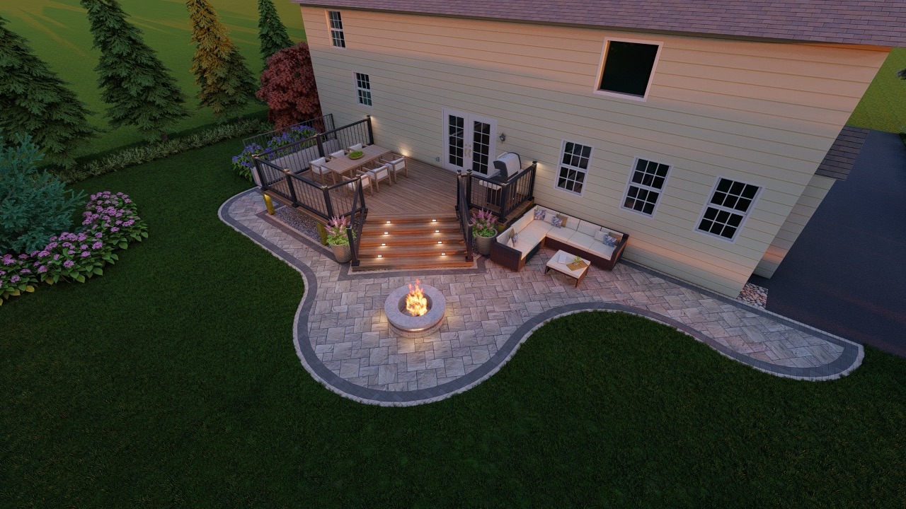 Modern backyard patio with wooden deck, fire pit, seating area, and dining table. Surrounded by greenery and landscaped gardens next to a house.