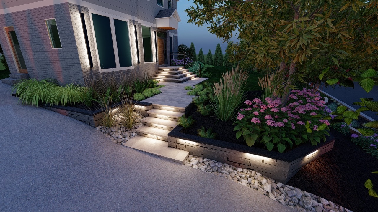 Modern home with illuminated pathway, lush landscaping, decorative plants, and stone accents. Nighttime ambiance creates a welcoming and serene entrance.
