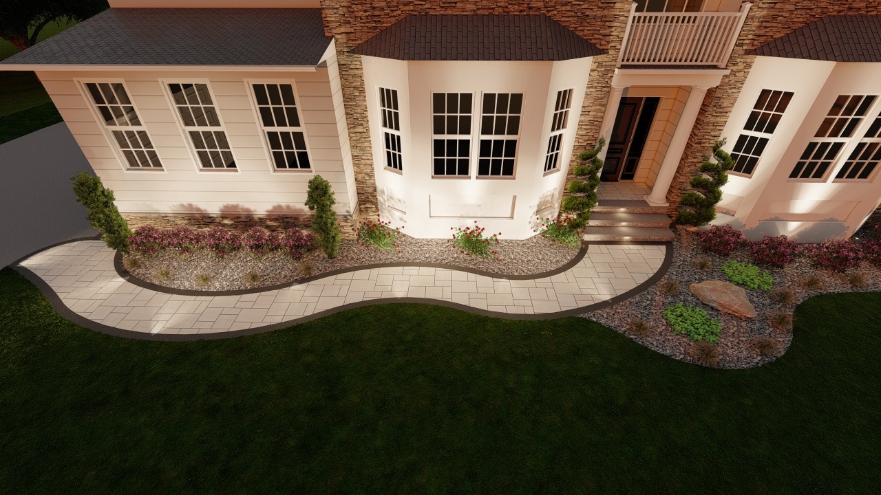 A beautiful house entrance with landscaped pathway, curved stone design, decorative plants, and well-maintained lawn, illuminated in warm evening light.