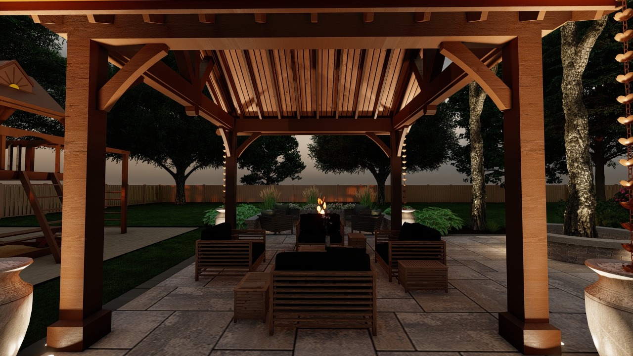 A cozy outdoor patio features wooden seating under a pergola, surrounded by lush greenery and lit by soft evening lights.